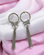 Silver hoop earrings with bow pendant - Image 2